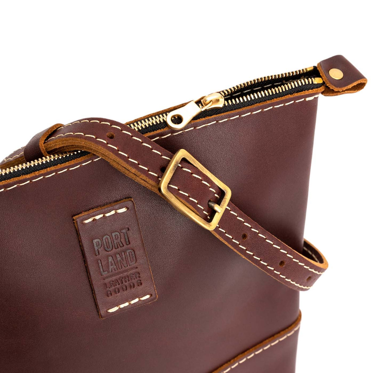  Cognac  | Small rectangular crossbody purse with top zipper and interior pocket