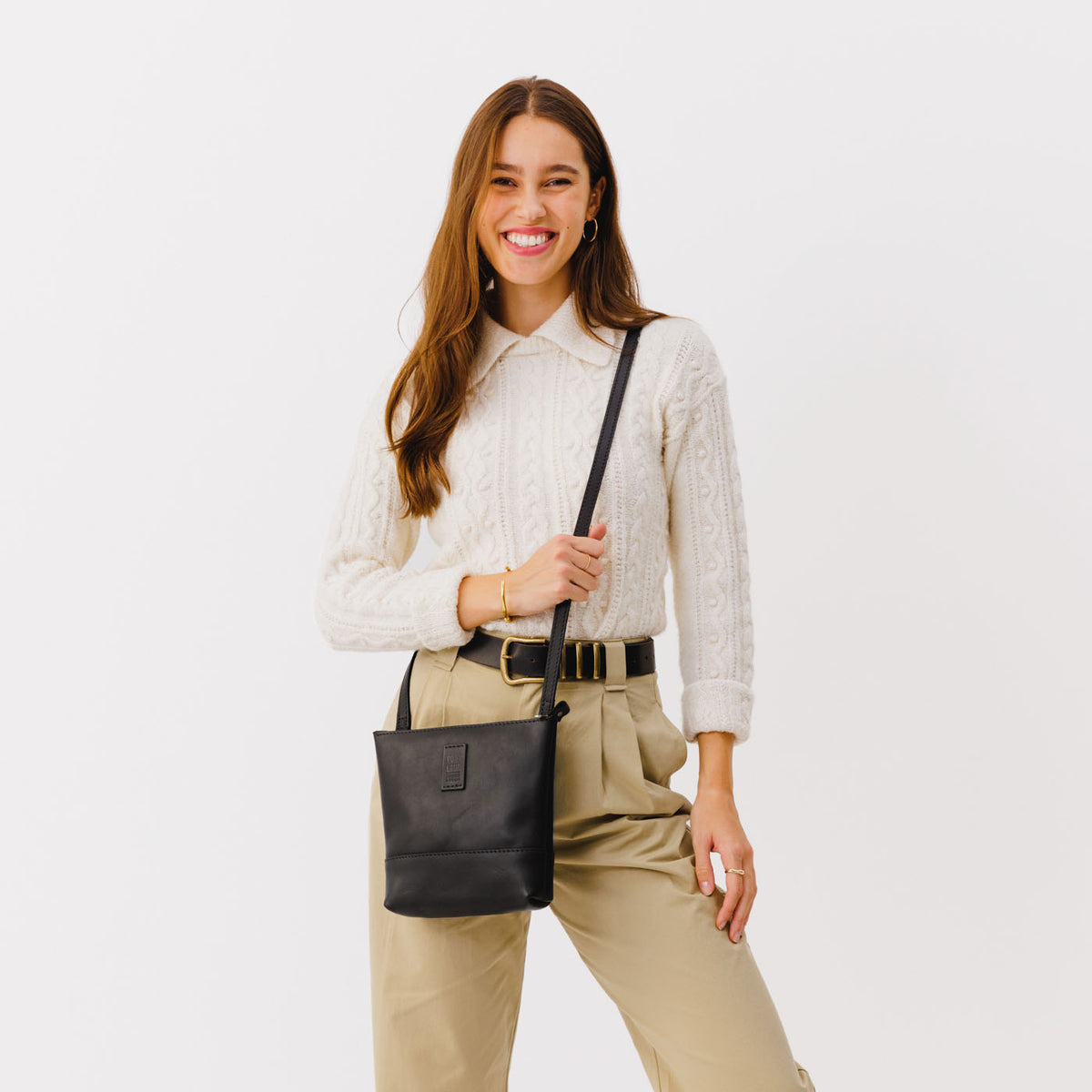  Black  | Small rectangular crossbody purse with top zipper and interior pocket