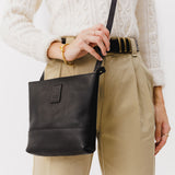  Black  | Small rectangular crossbody purse with top zipper and interior pocket