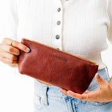 All Color: Nutmeg | Leather utility bag pouch with top zipper